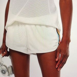 THE UPSIDE STRIPED MESH SHORTS